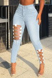 Light Blue Sexy Solid Hollowed Out Patchwork Chains High Waist Denim Jeans