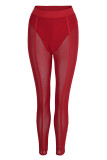 Tangerine Red Sexy Solid Patchwork See-through Regular High Waist Pencil Solid Color Bottoms