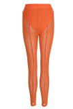 Tangerine Red Sexy Solid Patchwork See-through Regular High Waist Pencil Solid Color Bottoms