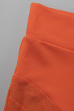 オレンジファッションセクシーパッチワークソリッドシースルージッパーカラーノースリーブツーピース