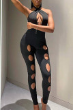 Black Fashion Sexy Solid Hollowed Out Backless Halter Skinny Jumpsuits