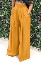 Fondo de color sólido convencional de cintura alta regular de patchwork sólido casual de moda amarillo