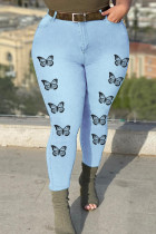 Jeans azzurri alla moda casual con stampa a farfalla patchwork taglie forti (senza cintura)