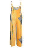 黄色のカジュアルプリントパッチワークスパゲッティストラッププラスサイズのジャンプスーツ