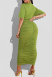 Grünes Mode-reizvolles festes ausgehöhltes heraus falten Sie O-Hals-Kurzarm-Kleid