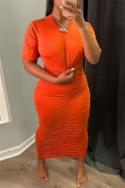 Vestido de manga corta con cuello en O y pliegues ahuecados sólidos sexy de moda naranja