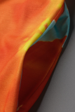 オレンジ色のファッションプリントパッチワークオフショルダーハーランジャンプスーツ