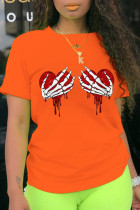 Orangefarbene Patchwork-T-Shirts mit O-Ausschnitt und modischem Aufdruck