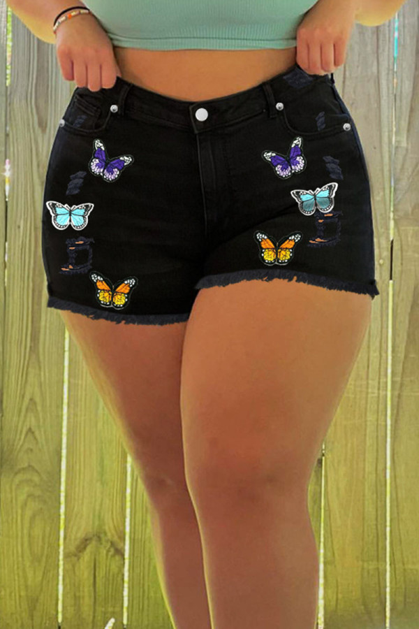 Schwarze Denim-Shorts mit lässigem Patchwork-Print, hoher Taille und gerader Positionierung