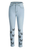 Hellblaue, modische, lässige Patchwork-Jeans mit hoher Taille und Schmetterlingsdruck
