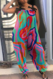 グリーンファッションカジュアルプリントパッチワークバックレススパゲッティストラップレギュラージャンプスーツ