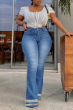 Jeans de mezclilla de cintura alta con retazos de borlas sólidas de calle casual azul