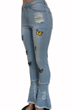 Babyblauwe casual denim jeans met vlinderprint en patchwork