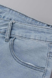 Jeans casual azul claro com estampa de rua rasgada patchwork plus size