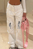 Pantaloni bianchi con stampa di posizionamento dritto a vita media con stampa patchwork alla moda