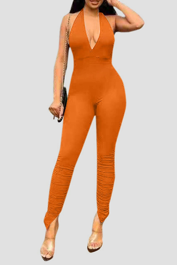 Orange Sexy Solid Patchwork Backless Halter Skinny Jumpsuits