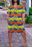 Vestido multicolorido moda casual estampa patchwork decote em v manga curta