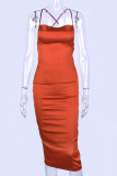 Tangerine Red Fashion Street Solid Backless Spaghetti Strap Wrapped Skirt Dresses