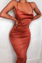Tangerine Red Fashion Street Solid Backless Spaghetti Strap Wrapped Skirt Dresses
