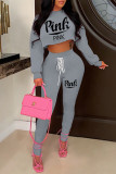 Orange Fashion Casual Letter Print Bandage Backless Hooded Collar Long Sleeve Two Pieces