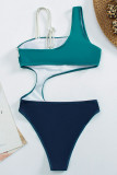 Blå sexigt tryck patchwork asymmetriska badkläder