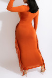 Orange Sexy Solid Tassel Patchwork O Neck One Step Skirt Dresses