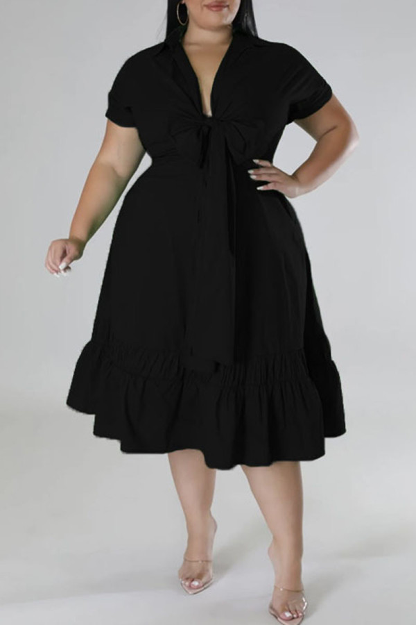 Pliegue de patchwork sólido casual negro con lazo cuello en V una línea vestidos de talla grande