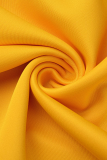 Tops jaunes à imprimé patchwork à col rond