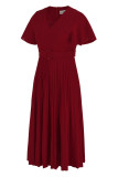 Vestidos plus size plissados ​​com decote em V de patchwork sólido vermelho elegante