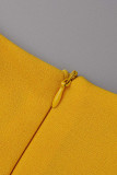 Vestidos de talla grande plisados ​​con cuello en V de patchwork sólido elegante amarillo