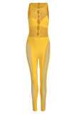 黄色のセクシーなソリッド中空メッシュOネックスキニージャンプスーツ