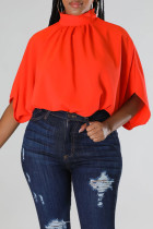 Camisetas de cuello alto de patchwork sólido casual rojo mandarina