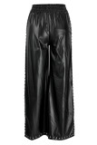 Zwarte mode casual effen patchwork spleet normale hoge taille broek