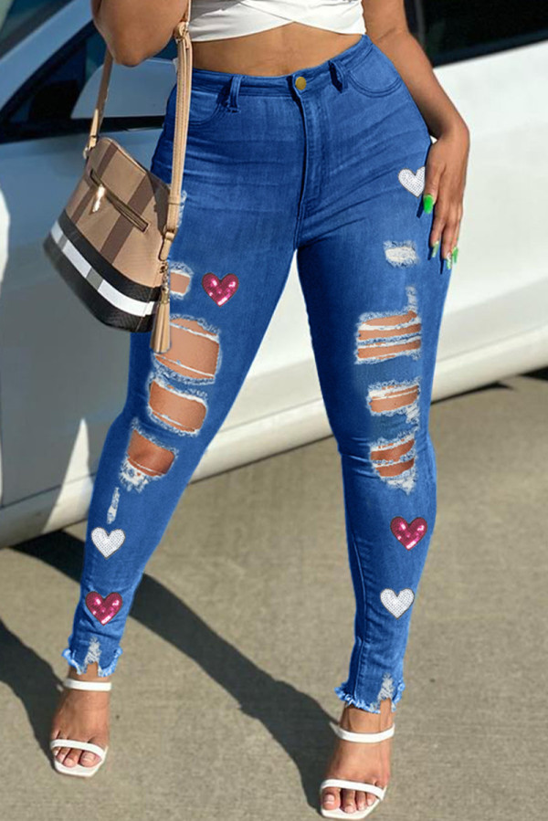 Jeans skinny in denim skinny a vita alta strappati con stampa casual blu medio