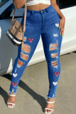 Mittelblaue, lässig bedruckte, zerrissene Skinny Jeans mit hoher Taille