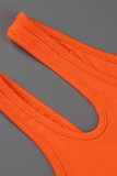 オレンジ色のセクシーなカジュアルソリッドくり抜かれた背中の開いたワンショルダースキニージャンプスーツ