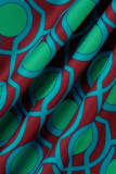 Macacão vermelho moda estampa patchwork decote em v com corte de bota