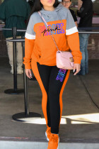 Abbigliamento sportivo casual arancione con stampa lettera patchwork collo con cappuccio manica lunga due pezzi