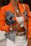 Oranje casual vest met patchworkprint bovenkleding