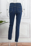 Dunkelblaue, lässige, zerrissene Patchwork-Quaste mit hoher Taille und dünner Denim-Jeans