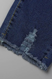 Dunkelblaue, lässige, zerrissene Patchwork-Quaste mit hoher Taille und dünner Denim-Jeans