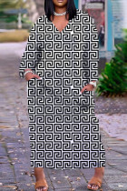 Zwarte rechte jurken met ruitjesprint en patchwork met V-hals