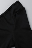 Schwarzer, sexy, fester, ausgehöhlter Patchwork-Overall mit asymmetrischem V-Ausschnitt