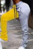 Calça preta amarela casual patchwork contraste regular cintura alta