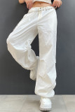 Pantalones de color sólido de pierna ancha de cintura baja recta con bolsillo de patchwork sólido de calle informal negro
