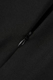 Svarta sexiga Casual Solid urholkade asymmetriska O-hals långärmade klänningar