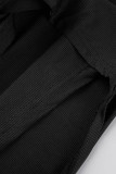 Schwarze, lässige, bedruckte Schlitze mit halbem Rollkragen und langen Ärmeln