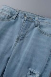 Jeans blu chiaro casual strappati strappati a vita alta in denim normale