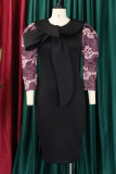 Vestidos de saia de um passo preto elegante estampado com laço e decote