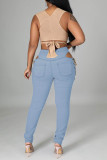 Jeans skinny in denim a vita media con frenulo strappato casual blu chiaro